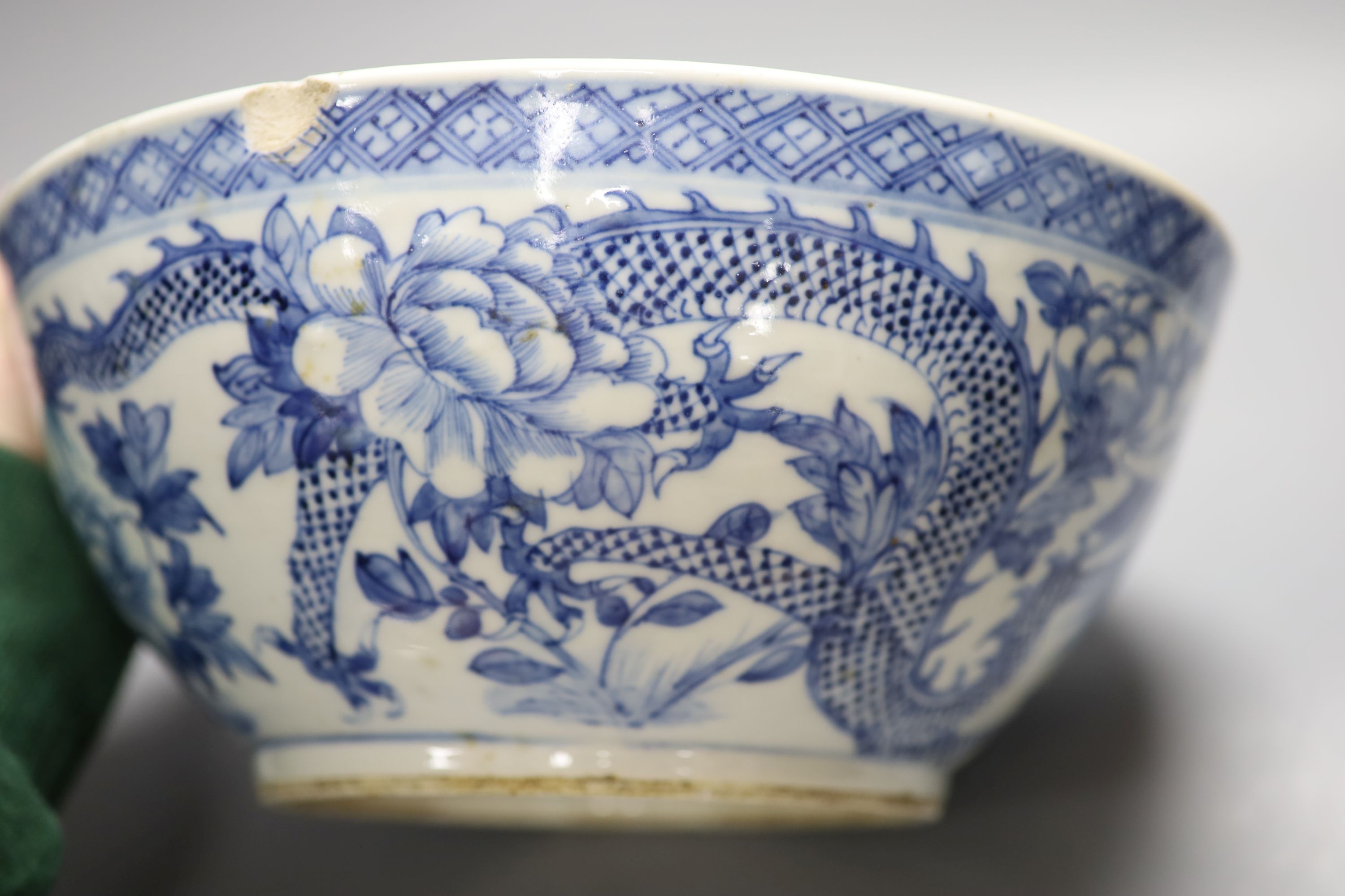 A 19th century Chinese porcelain blue and white dragon bowl, diameter 30cm